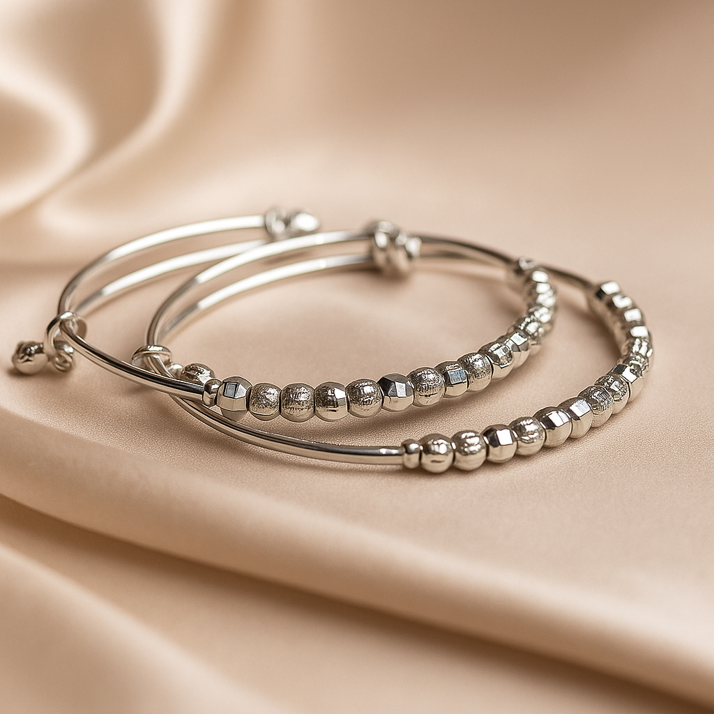 Gleaming Silver Bead Bangles with Faux Stone Detail
