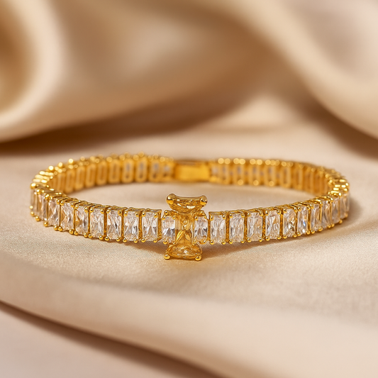 Elegance Embraced: Gold-Toned Tennis Bracelet with Cubic Zirconia Stones