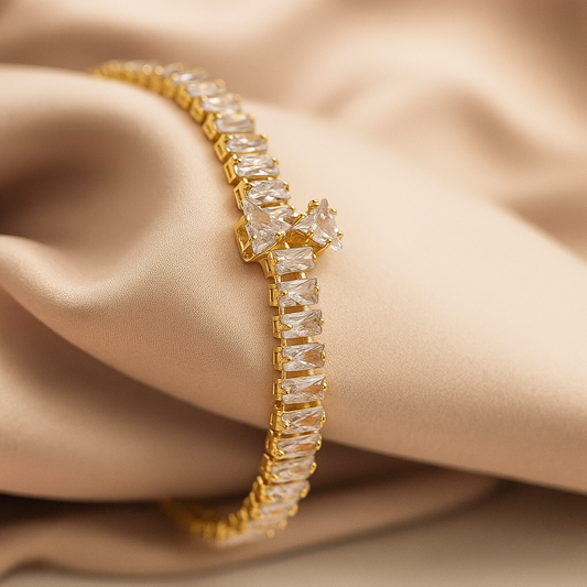 Elegance Embraced: Gold-Toned Crystal Tennis Bracelet