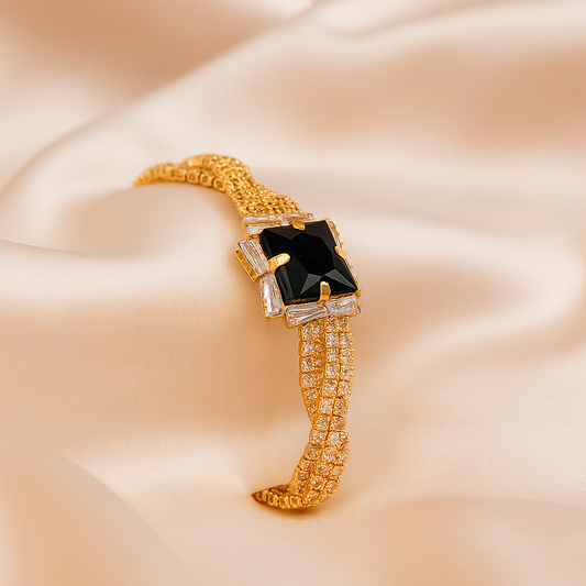 Elegance Embraced: Black Onyx Gold-Toned Watch