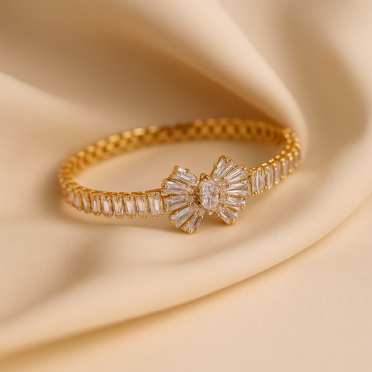 Elegance Embraced: Gold-Toned Crystal Flower Bangle